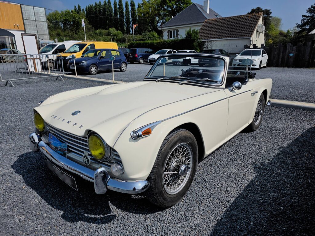 a white car parked in a lot