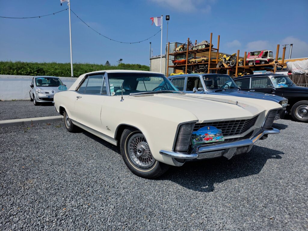 a white car parked in a parking lot